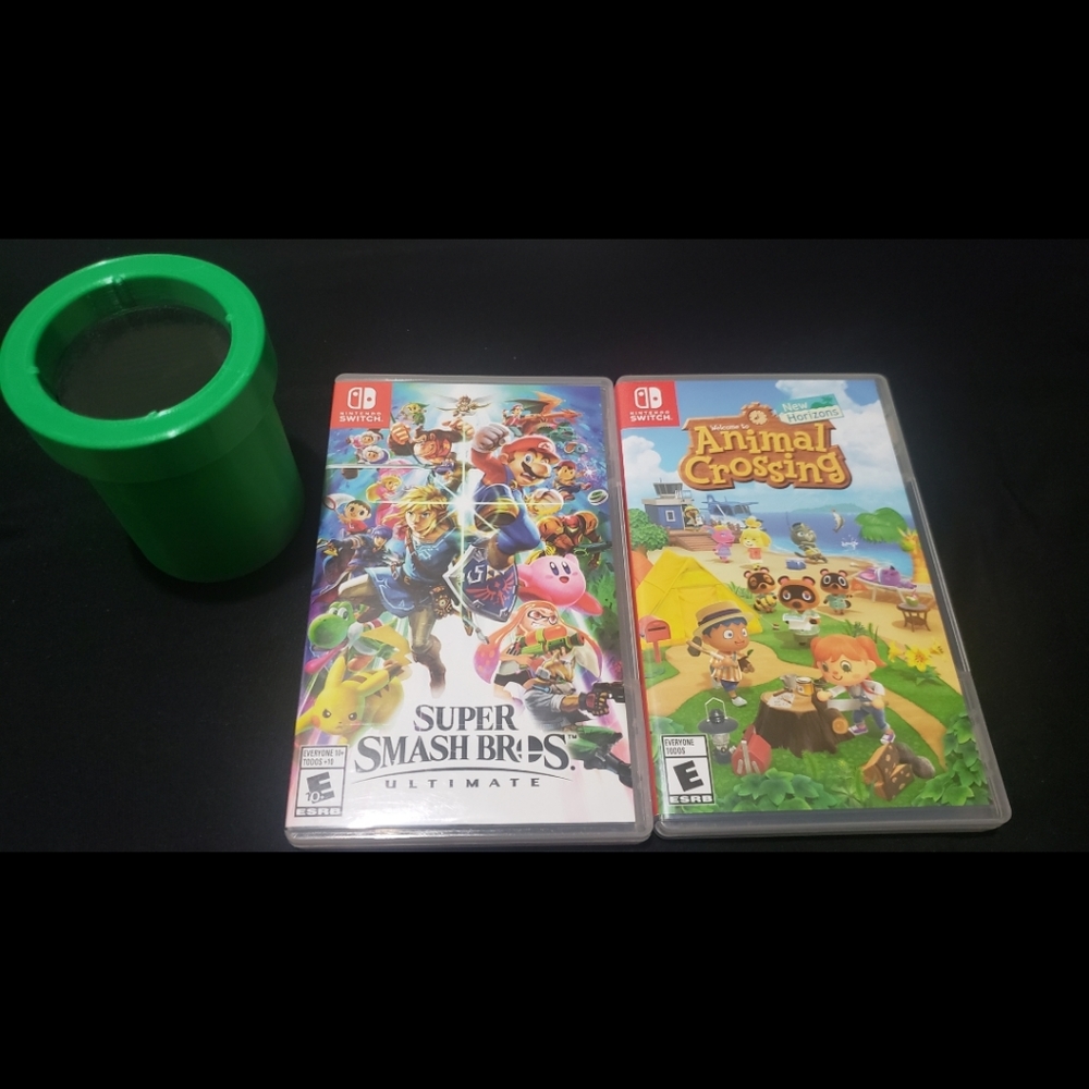 Nintendo Switch (2) Game Bundle. Super Smash Bros Ultimate & Animal Crossing NH